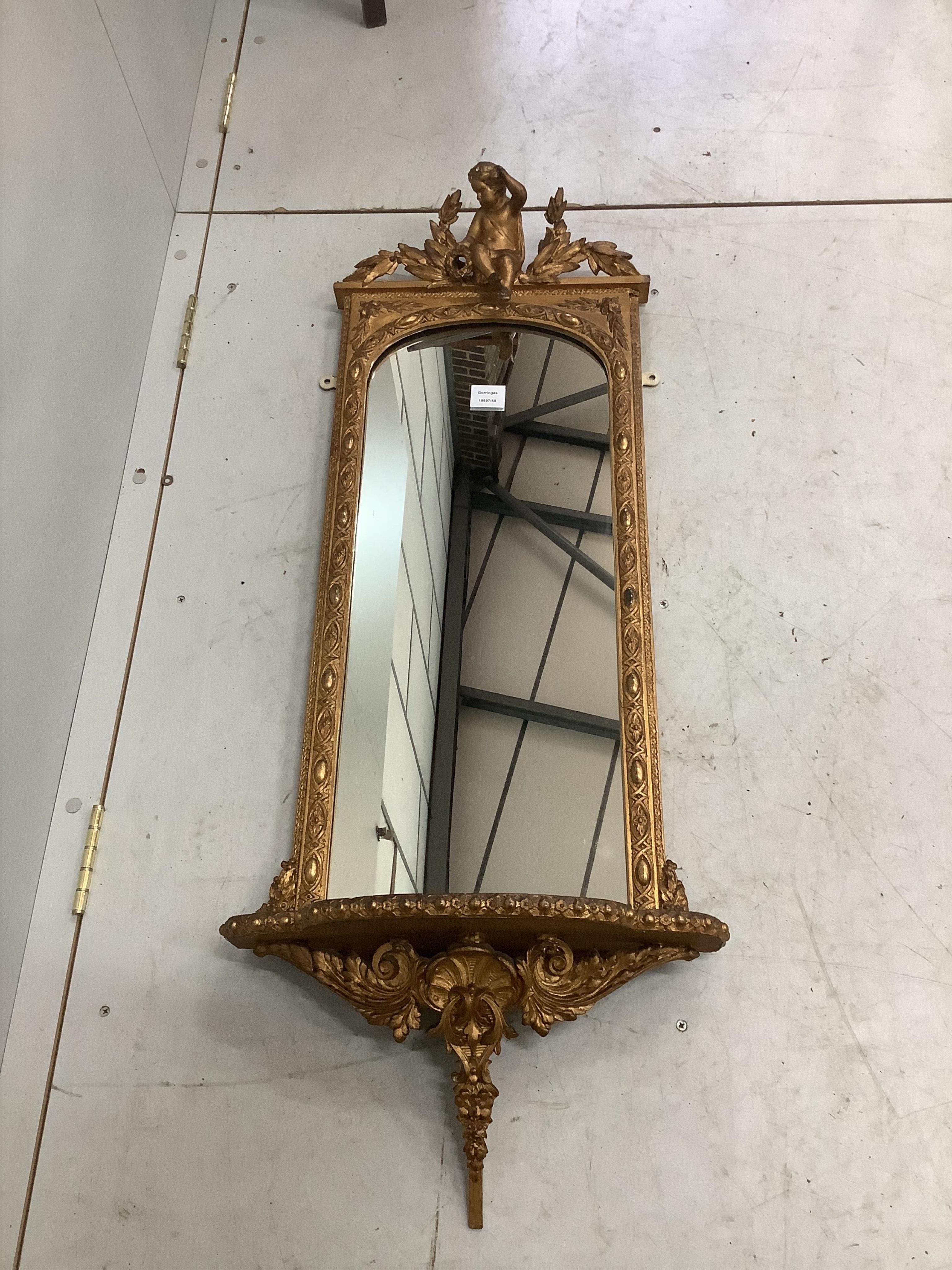 A Victorian giltwood and composition pier glass, width 46cm, height 110cm. Condition - fair